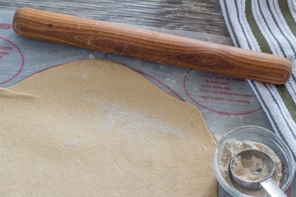 whole wheat pizza dough rolled thinly