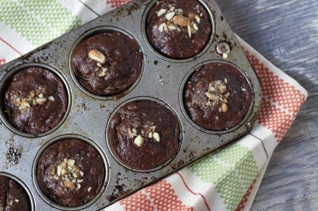 Chocolate Zucchini Muffins in muffin tins, baked