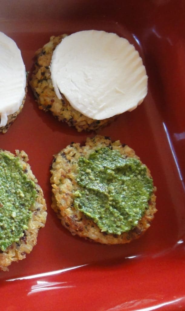 closeup view of assembling the Veggie Patties with mozzarella cheese and pesto