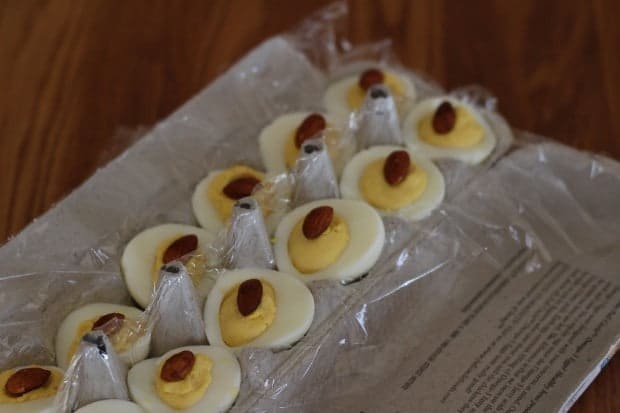 tamari deviled eggs to go in plastic film-lined egg carton