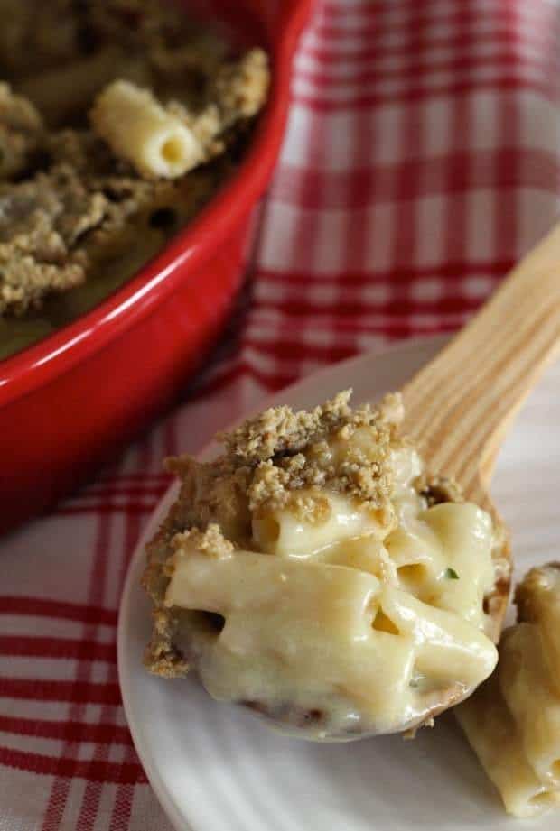 Sunflower Crusted Macaroni and Cheese in a wooden spoon
