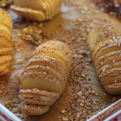Hasselback Potatoes with Dukkah Spice on tray