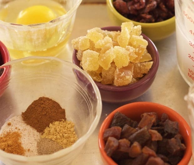 bowls of candied ginter, dried fruit and spices, the ingredients for Gingery Hot Cross Buns 