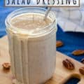 Jar of dressing with overflowing out of jar with text for Pinterest