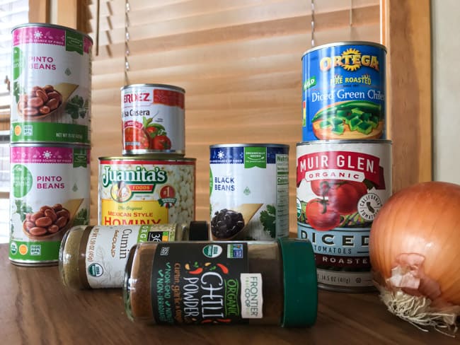 7 cans of ingredients for vegetarian pantry chili
