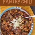Vegetarian pantry chili in a bowl with cheese sprinkle on top, and with text for Pinterest