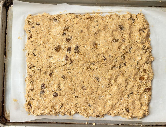 Oatmeal Rosemary Scone dough patted into rectangle on baking sheet