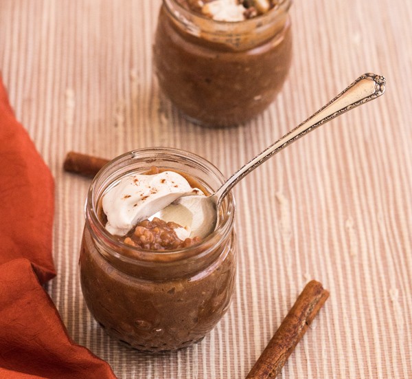 Pumpkin Date Rice Pudding in jar with spoon