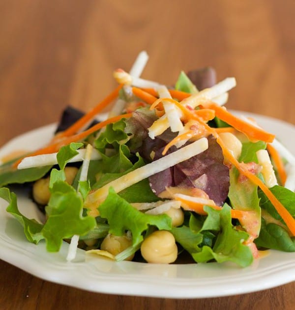 Salad lightly dressed with Hummus Vinaigrette Salad Dressing 
