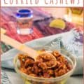 curry roasted cashews in a bowl with text for Pinterest