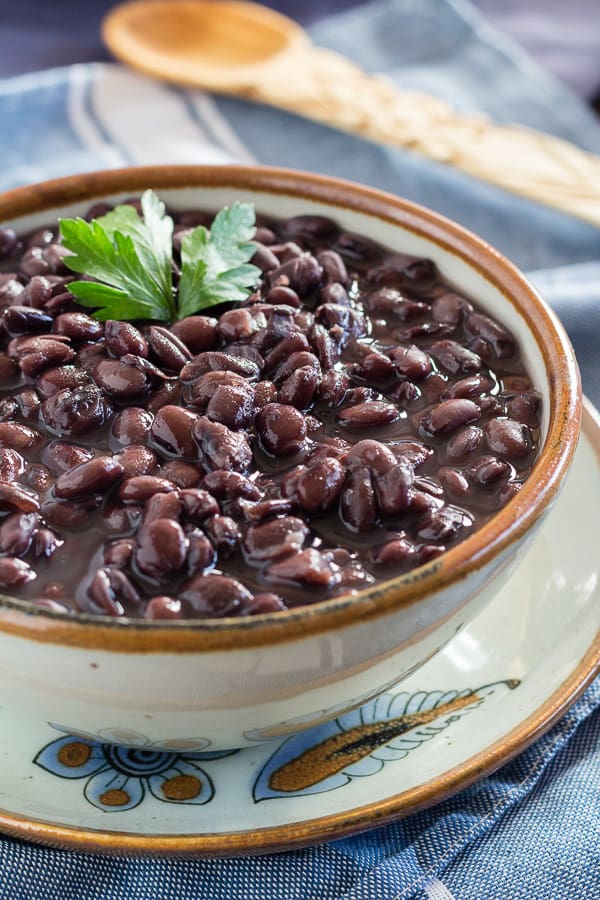 Big bowl of cooked black beans for How to Cook Black Beans in a Pressure Cooker