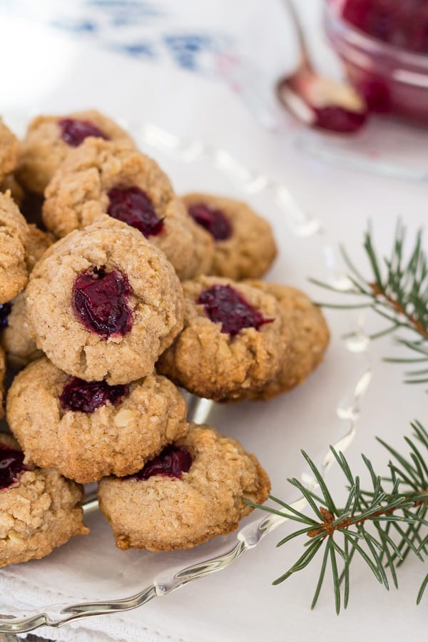 Almond Cranberry Thumbprint Cookies with cookies on left