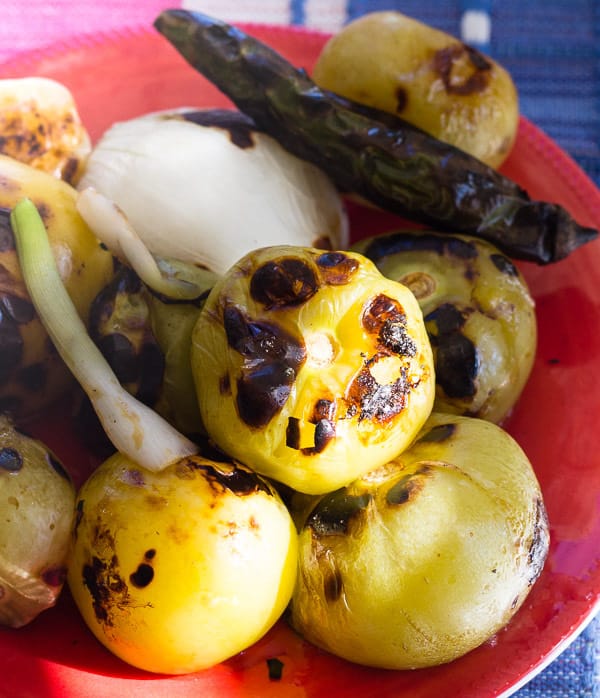 charred ingredients for Roasted Green Tomatillo Salsa