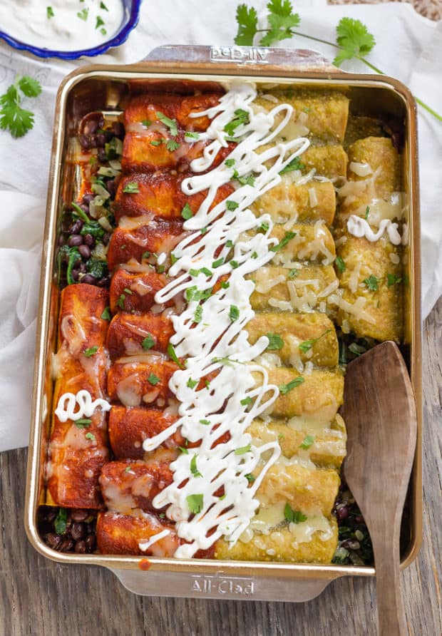 Vertical pan of baked Spinach and Black Bean Enchiladas