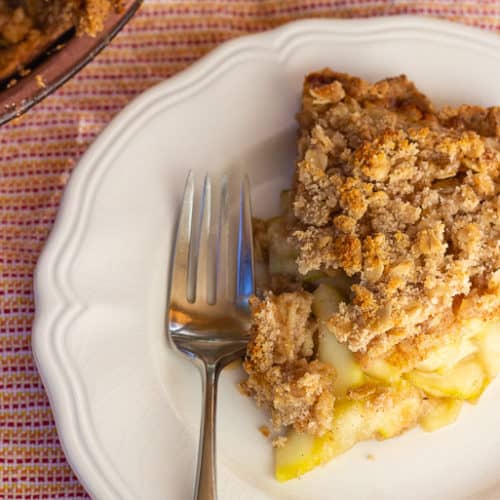 Slice of Zucchini Mock Apple Pie with Oat Almond Crumble