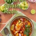 Butternut Squash Pozole in bowl with garnishes for Pinterest