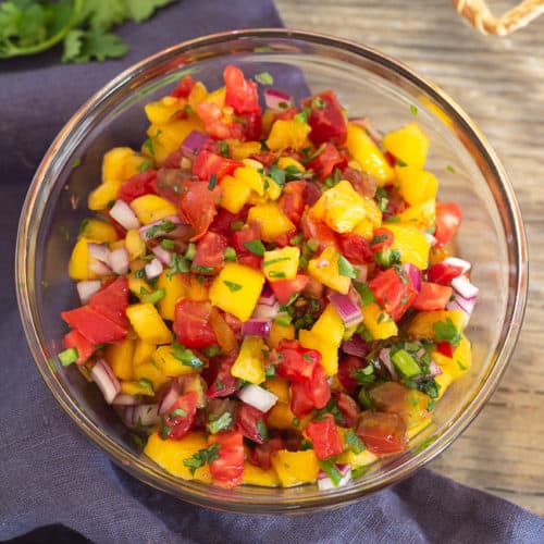 overhead shot of salsa in glass bowl