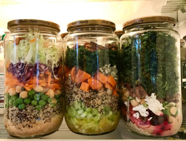 3 different salads, layered in jars