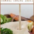 tahini sauce pouring over vegetables with text for Pinterest