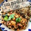 chickpea curry and quinoa in blue rimmed bowl with text for Pinteresr